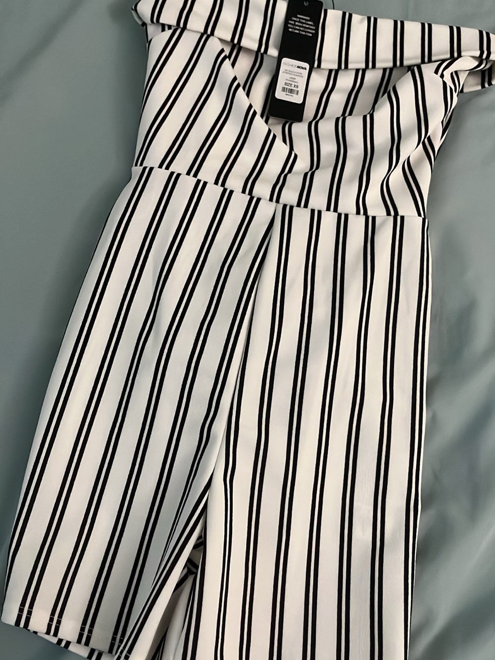 Fashion Nova White and Black Striped Off-Shoulder Jumpsuit
